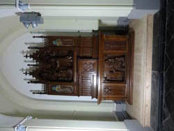 Restauration des autels latéraux en bois de l'église à  Wilskerke